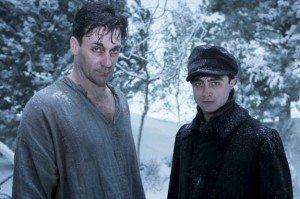 Daniel Radcliff and John Hamm Sponge Each Other Down