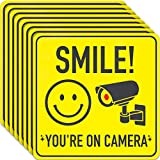 Smile You're On Camera Sign Stickers - 7 X 7 Inch - 8 Pack - Polite Video Surveillance Signs to Prevent Trespassing on Private Property - Perfect for House, Business, Yard or Private Driveway (Adhesive Stickers)