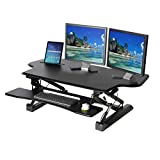 Seville Classics OFF65878 AIRLIFT 47" Extra-Wide Gas-Spring Height Adjustable Standing Desk Converter Workstation Ergonomic Dual Monitor Riser with Keyboard Tray and Phone/Tablet Holder Large, Black