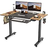 FEZIBO Dual Motor Height Adjustable Electric Standing Desk with Keyboard Tray, 55 x 24 Inch Sit Stand Table with Splice Board, Black Frame/Rustic Brown and Black Top