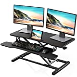 FITUEYES Height Adjustable Standing Desk 36 Wide Sit to Stand Converter Stand Up Desk Tabletop Workstation for Laptops Dual Monitor Riser Black SD309101WB