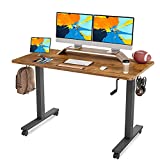 FAMISKY Crank Adjustable Height Standing Desk, 55 x 24 Inches Manual Stand up Desk, Sit Stand Workstation for Home Office with Handle and Splice Board, Black Frame/Walnut Top