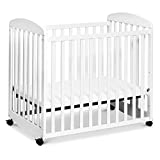 DaVinci Alpha Mini Rocking Crib in White, Removable Wheels, Greenguard Gold Certified