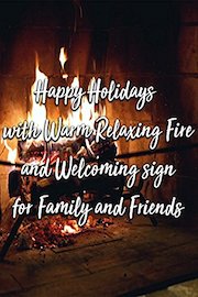 Happy Holidays with Warm Relaxing Fire and Welcoming sign for Family and Friends