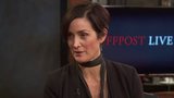 Carrie-Anne Moss and Benjamin Watson